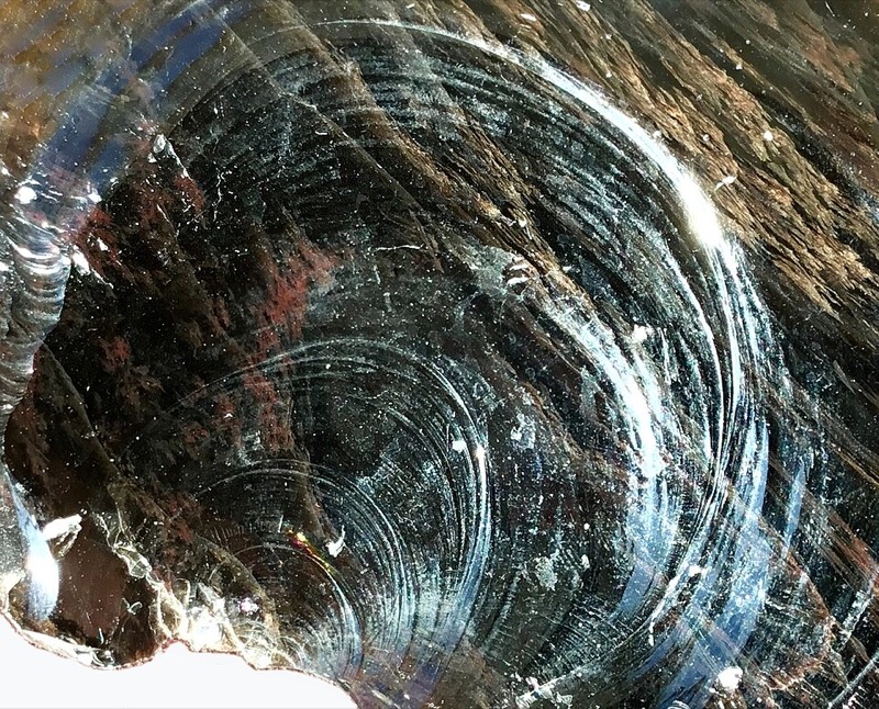 Obsidian with conchoidal fracture